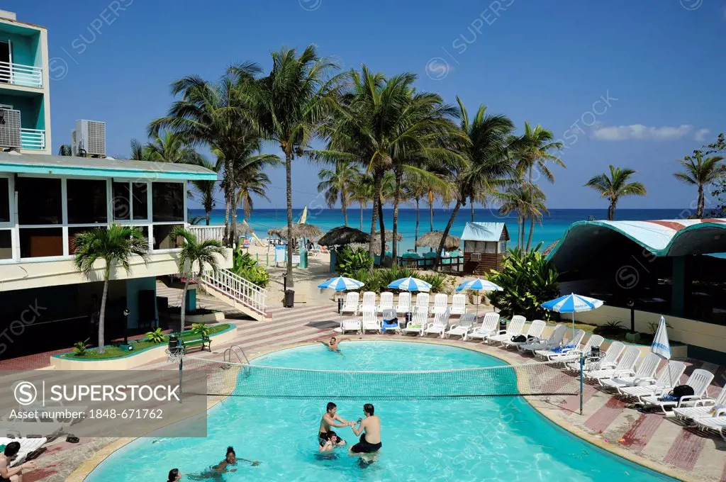 Hotel Atlantico, swimming pool and beach with palm trees, Santa Maria del Mar, Playas del Este, Havana, Habana, Cuba, Greater Antilles, Gulf of Mexico...