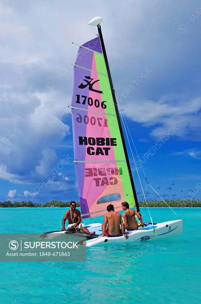 Tourists on a catamaran, St. Regis Bora Bora Resort, Bora Bora, Leeward Islands, Society Islands, French Polynesia, Pacific Ocean