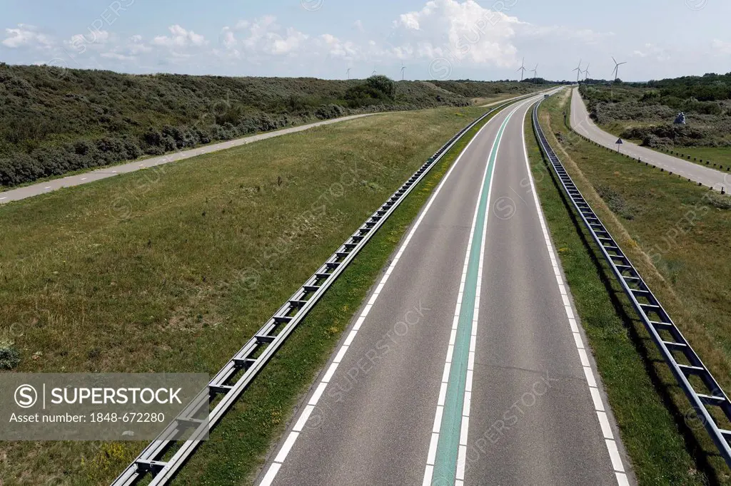 Street with a green median strip, traffic free, Veerse Dam between Walcheren and Noord-Beveland, Zeeland, Netherlands, Europe