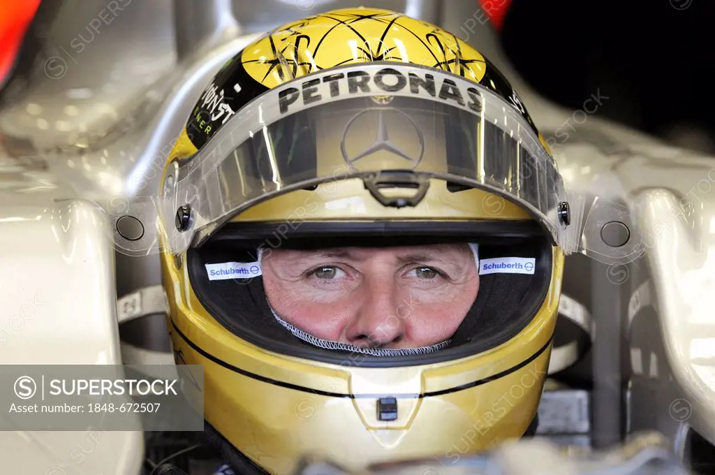 Michael Schumacher wearing a golden anniversary helmet, Formula 1, Belgian Grand Prix 2011, Spa-Francorchamps race track, Belgium, Europe