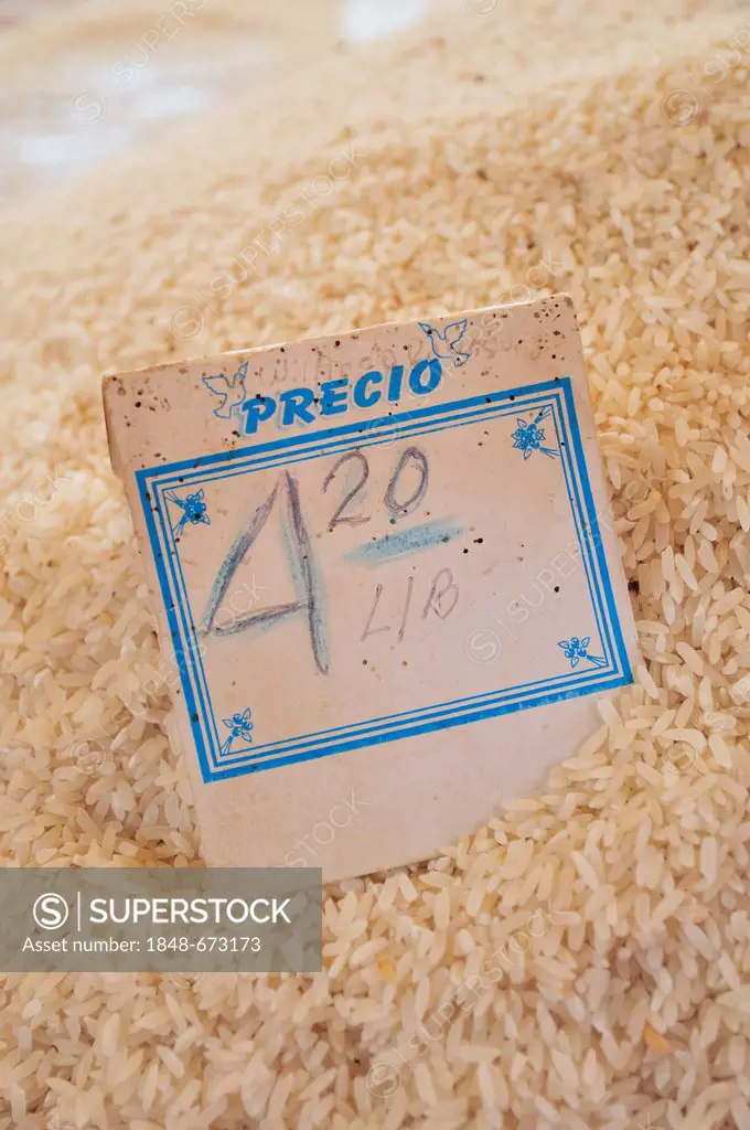Price tag on a pile on rice at the market of Sancti Spiritus, government-controlled pricing, Cuba, Caribbean