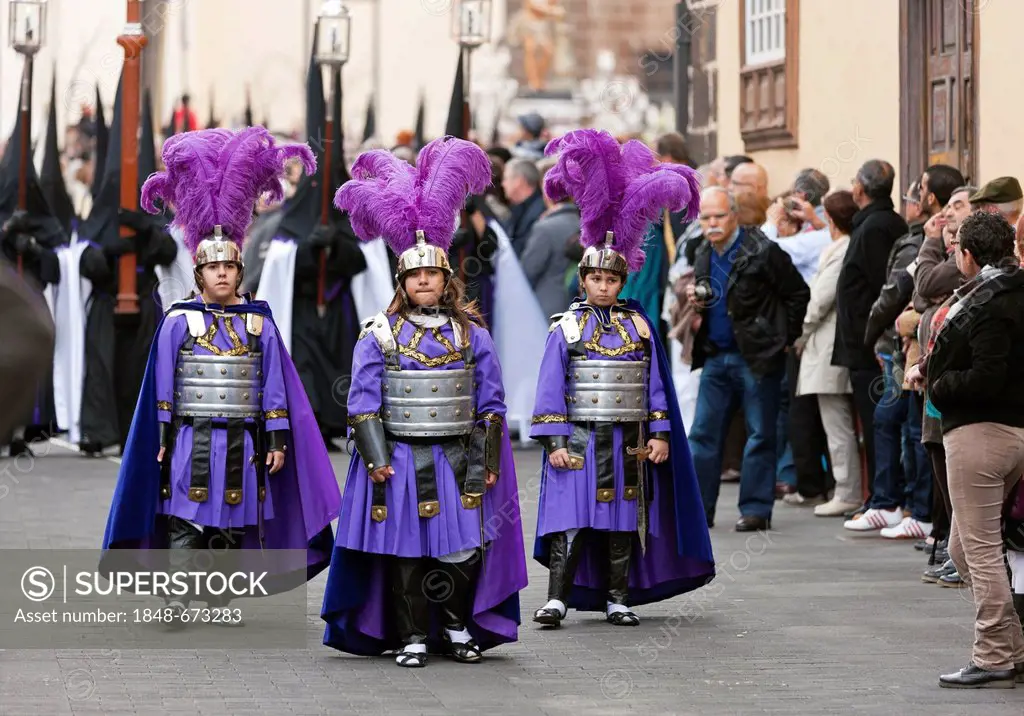 Children in historical costumes during the Good Friday procession, Semana Santa, Holy Week, La Laguna, northeastern Tenerife, Tenerife, Canary Islands...