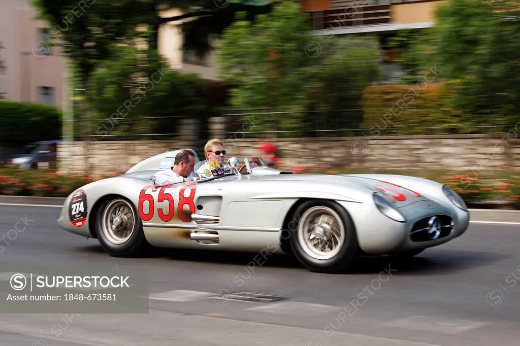 Mika Hakkinen and Juan Manuel Fangio Jr., driving a Mercedes-Benz 300 SLR vintage car from the Mercedes Museum, built in 1955, Mille Miglia 2011, Bres...