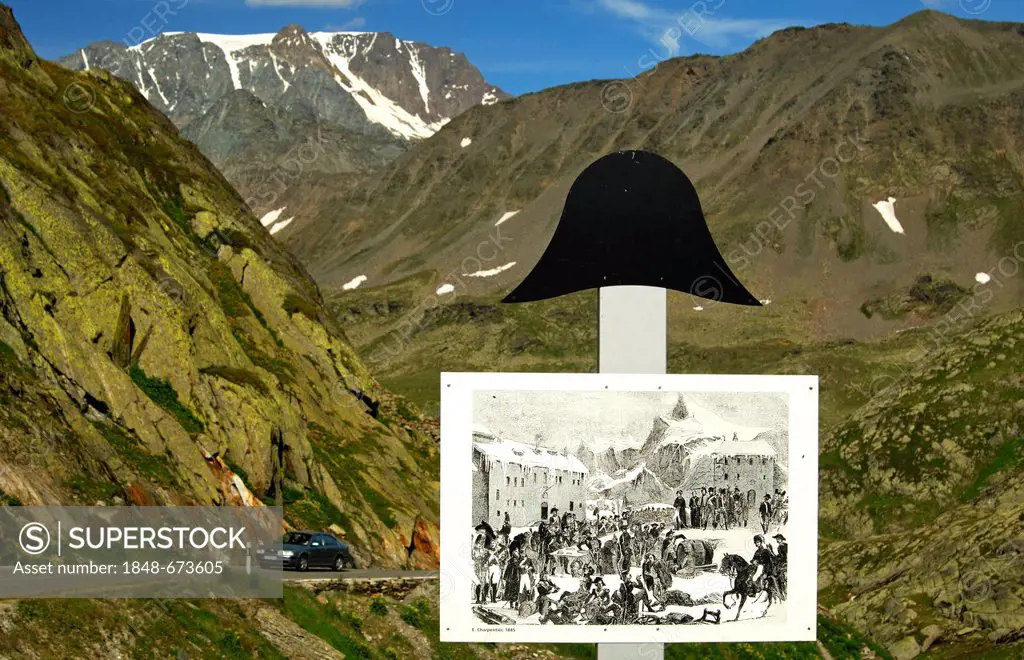 Picture plaque with historical scenes of Napoleon crossing the alps, above a Napoleon hat or bicorne, on the road to the Great St. Bernard Pass, Valai...