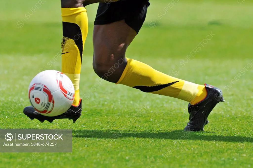 Legs of an Alemannia Aachen player playing the ball, during match versus Fortuna Duesseldorf, 2nd Bundesliga, Airberlin World, Duesseldorf, North Rhin...
