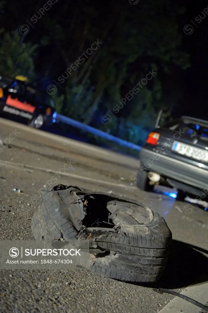 Crash site, a torn off wheel with the wheel suspension, Remseck, Baden-Wuerttemberg, Germany, Europe