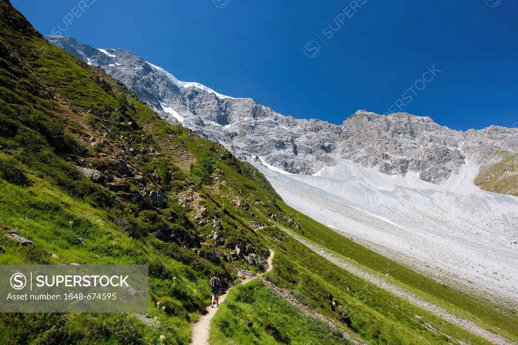 Hiker in the Ortler Alps mountain range, South Tyrol, Italy, Europe