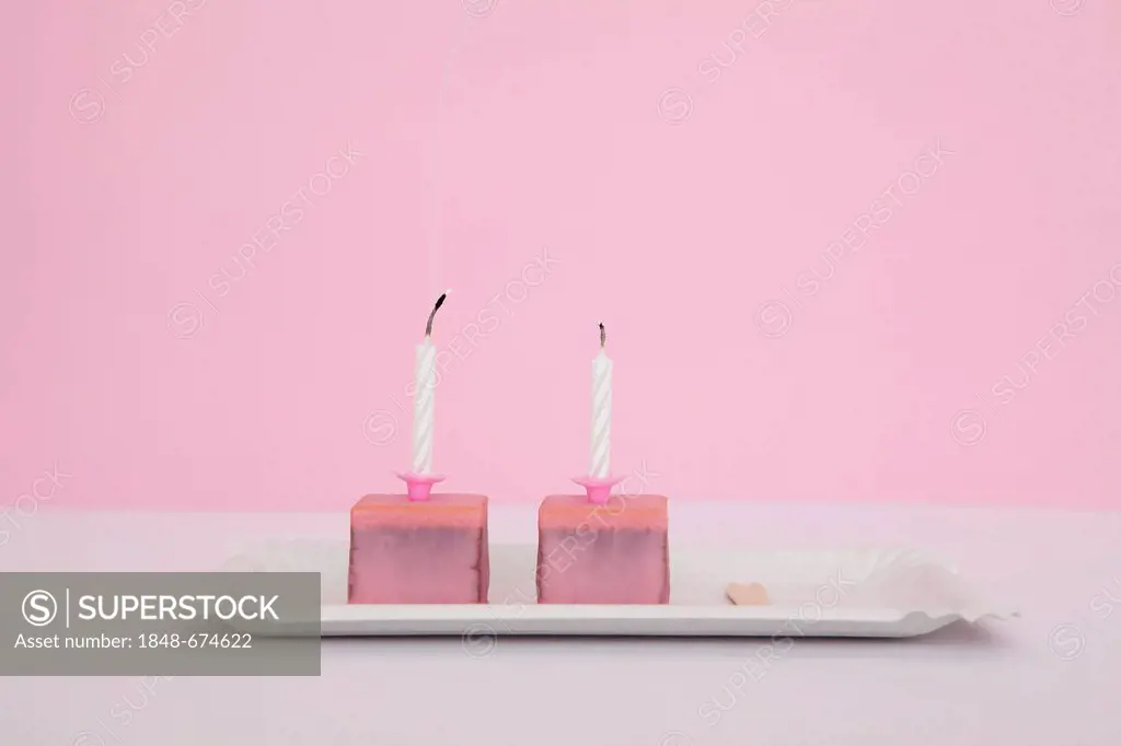 Pink chocolates, birthday candles