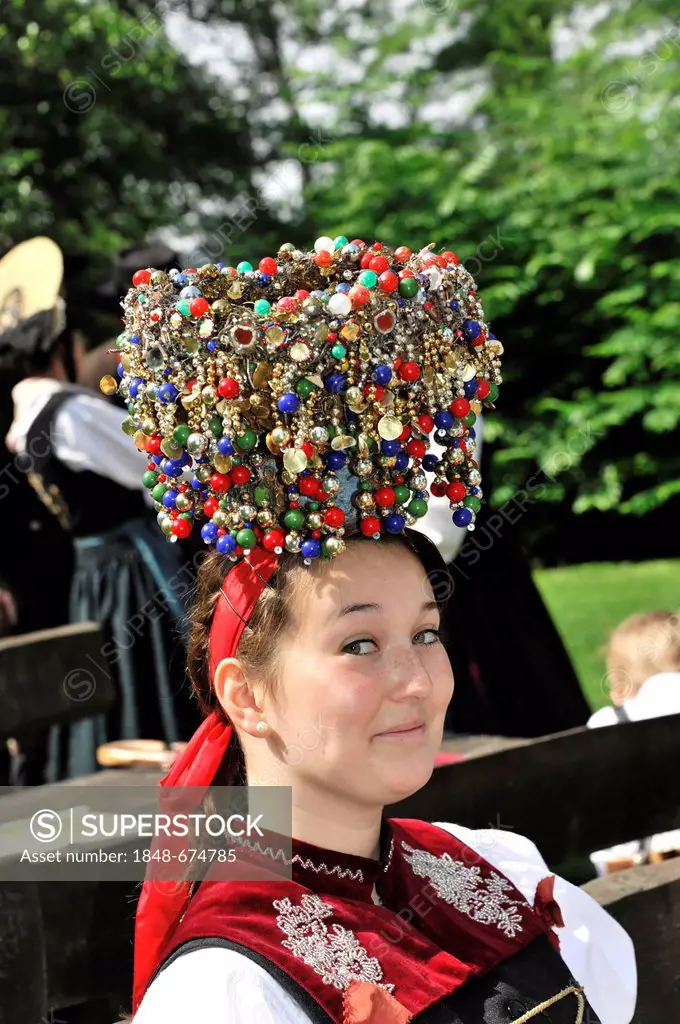 Woman with costume jewelry, portrait, 1. Internationaler Bodensee-Trachtentag traditional costume festival on 22nd May 2011, Mainau island, Lake Const...