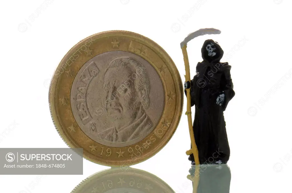 Death is standing next to a Spanish euro coin, symbolic image for the crisis of the euro
