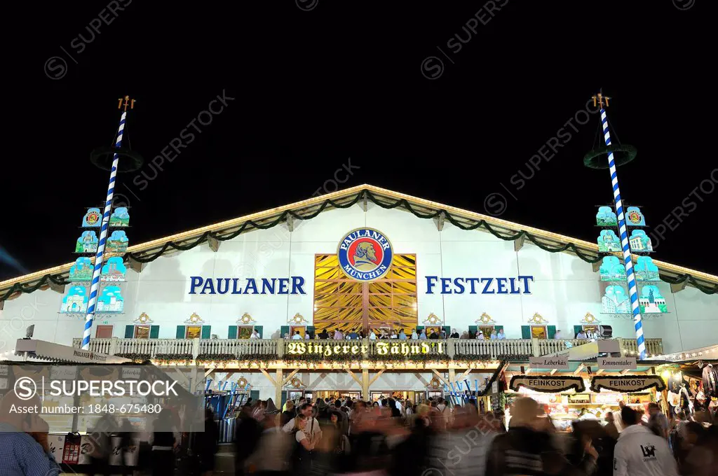 Brightly illuminated Paulaner Brauerei Winzerer Faehnd'l festival tent at night, Oktoberfest 2010, Munich, Upper Bavaria, Bavaria, Germany, Europe