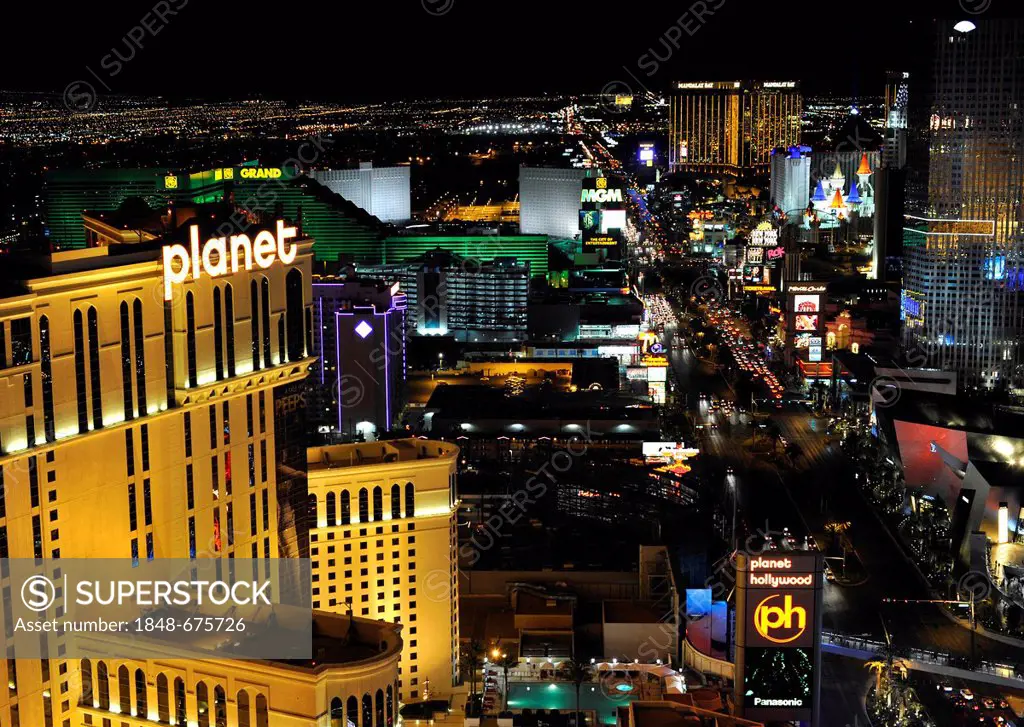 Night scene, The Strip, Planet Hollywood luxury hotel, MGM Grand, New York, Mandalay Bay, Excalibur, Vegas, Nevada, United States of America, USA, Pub...