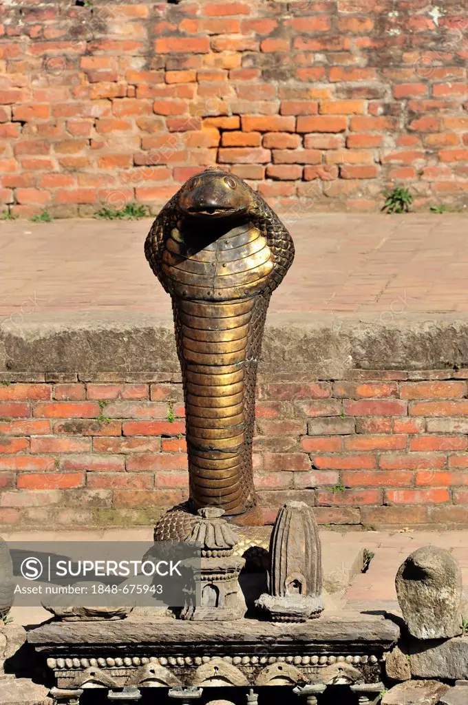 Bronze cobra at the Nag Pokhari well, historic district of Bhaktapur, UNESCO World Heritage Site, Kathmandu, Nepal, Asia