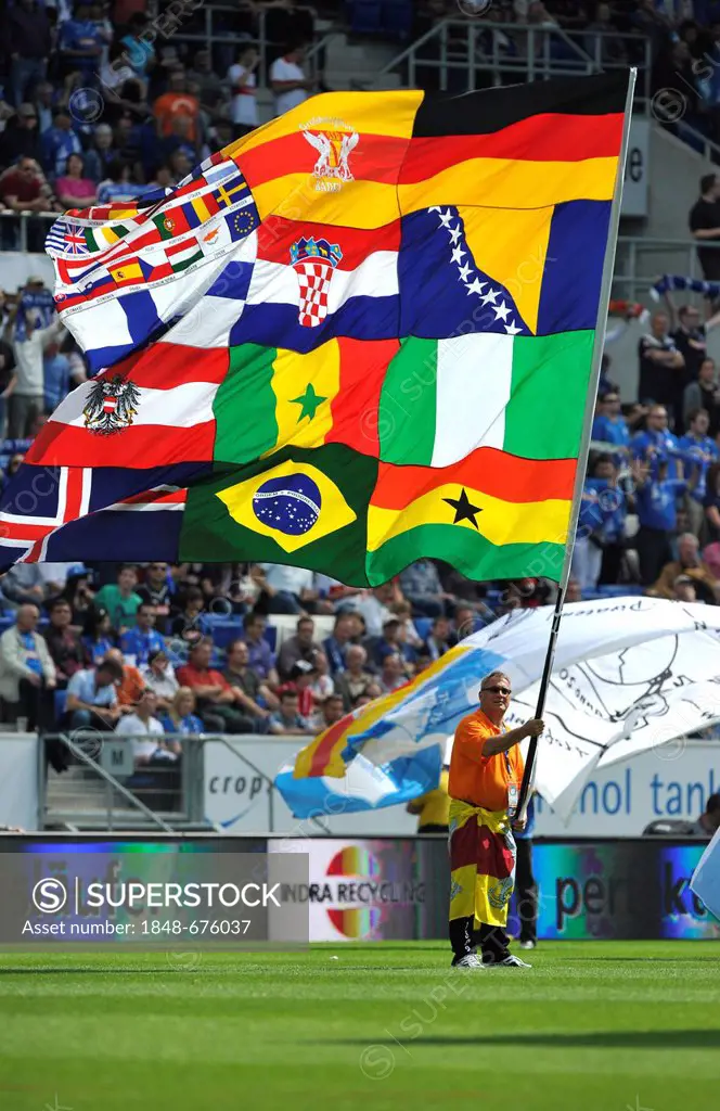 Standard-bearer with various flags on a flag, Rhein-Neckar-Arena, Sinsheim Hoffenheim, Baden-Wuerttemberg, Germany, Europe