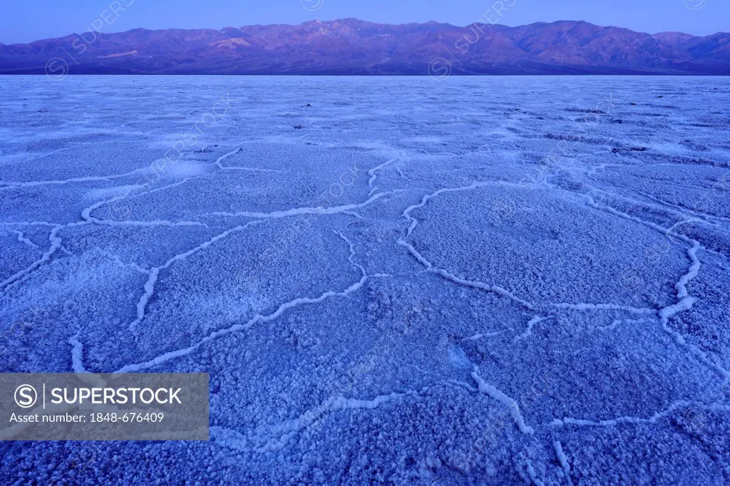 Salt pan, salt crystals, before sunrise in the Badwater Basin, dawn, Panamint Range, Death Valley National Park, Mojave Desert, California, USA
