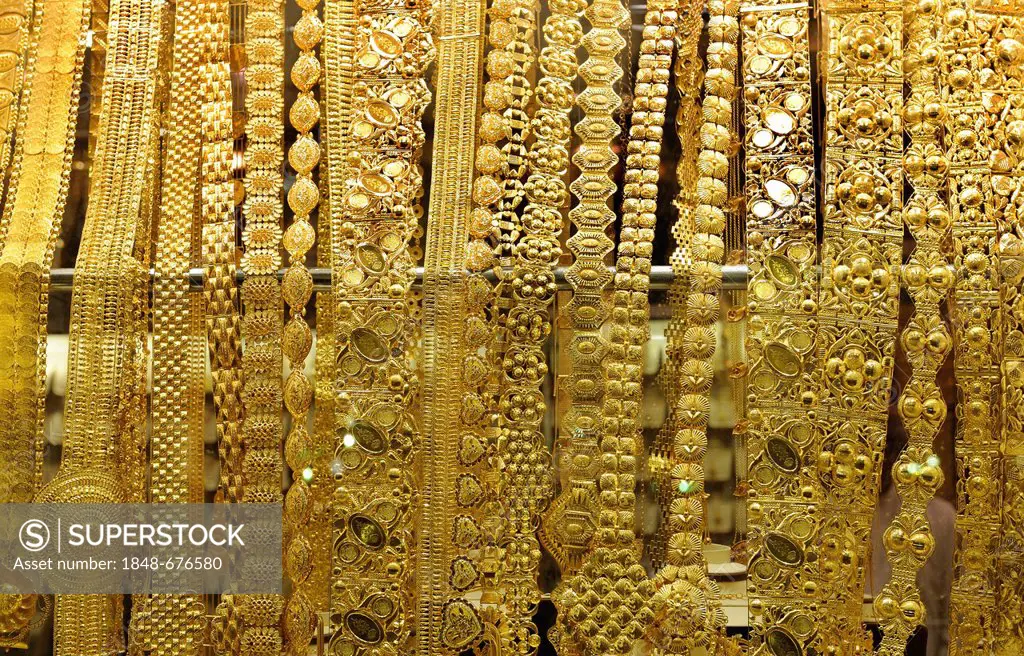 Gold jewellery in the Gold Souk of Deira, Dubai, United Arab Emirates, Arabia, Middle East, Asia