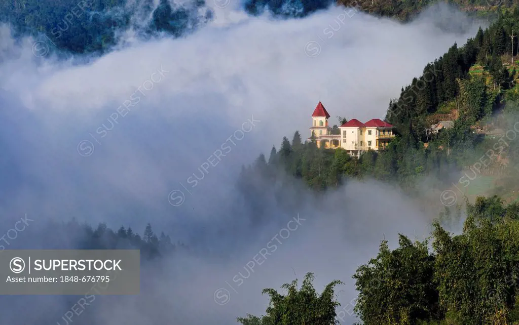 Villa in the early morning with cloud sea in the mountains in Sapa or Sa Pa, Lao Cai province, northern Vietnam, Vietnam, Southeast Asia, Asia