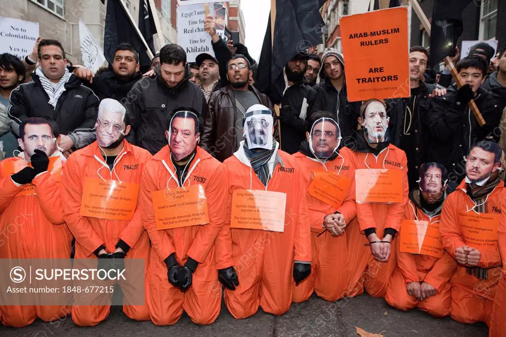 Anti-Mubarak Protest, pro-Sharia law supporters wearing orange Guantanamo Bay-style overalls and masks of Arab leaders, London, England, United Kingdo...