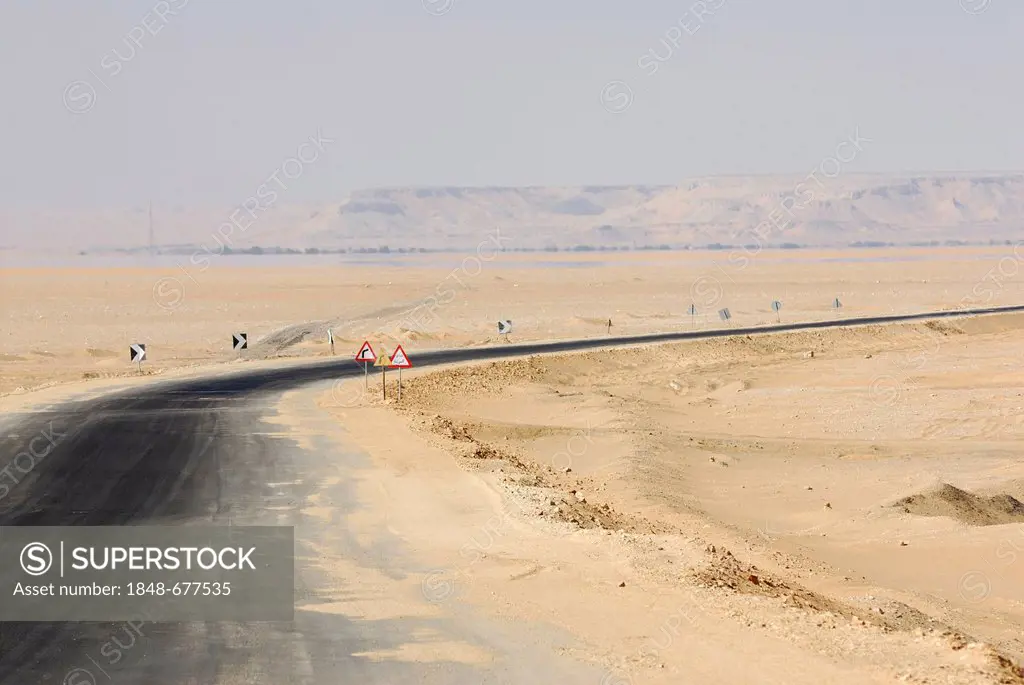 Desert road between the Farafra Oasis and the Dakhla Oasis, Western Desert, Egypt, Africa