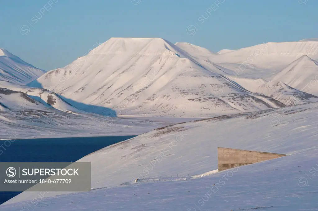 The entrance to the Svalbard Global Seed Vault, Adventfjorden, Advent Bay at back, Longyearbyen, Spitsbergen, Svalbard, Norway, Europe
