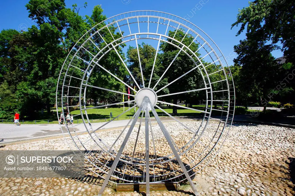 Water wheel, sculpture in the Riedergarten garden, Rosenheim, Upper Bavaria, Bavaria, Germany, Europe