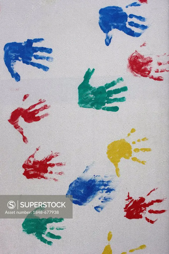 Colorful prints of children's hands, art