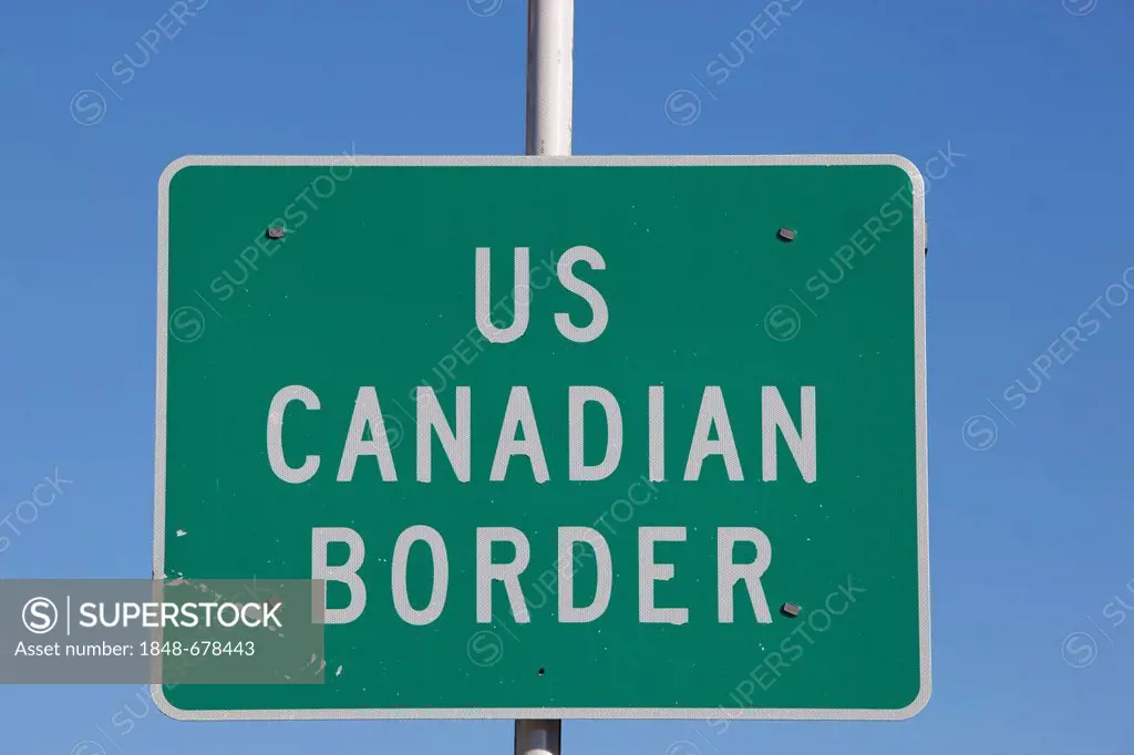 US - Canadian border crossing sign, White Pass, south Klondike Highway, Alaska and British Columbia, B. C., Canada