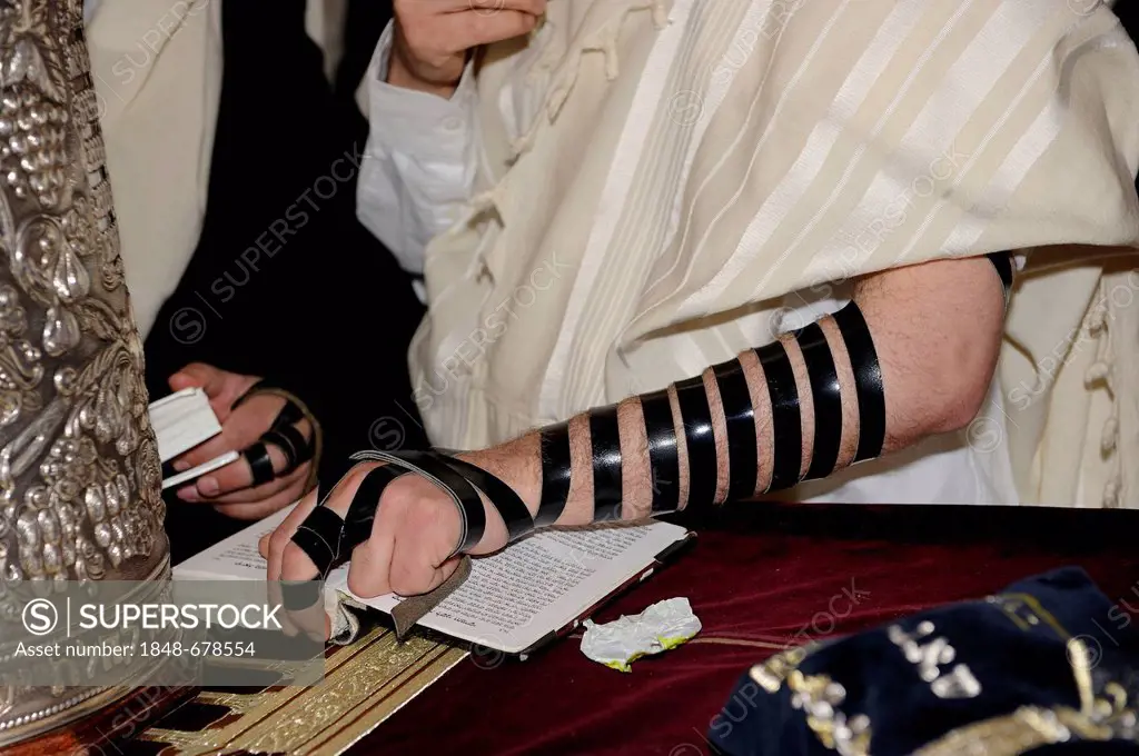 Bar Mitzvah, Jewish coming of age ritual, phylacteries on the arms of a youth, underground part of the Western Wall or Wailing Wall, Old City of Jerus...