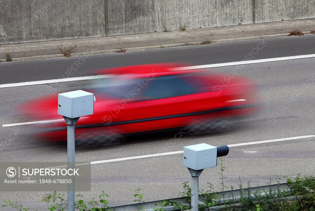 Radar controlled speed monitoring with speed cameras, on the Autobahn A44 motorway, in a 100 kilometers per hour speed-limit zone, Duesseldorf, North ...