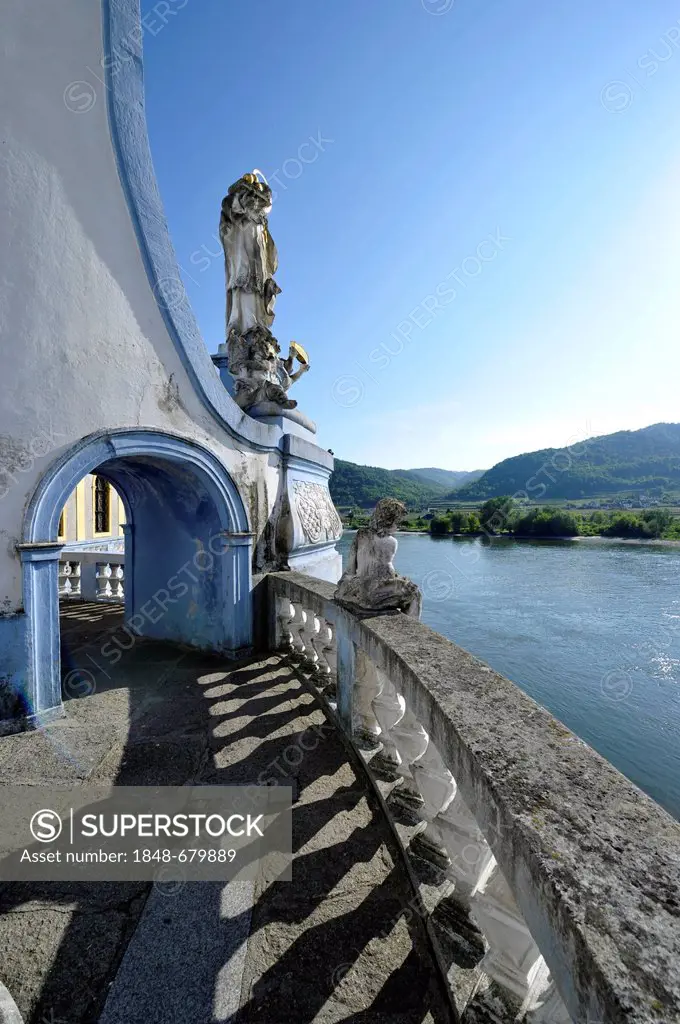 Duernstein Abbey, view from the balcony, Danube River, Baroque angel, Wachau Cultural Landscape, a UNESCO World Heritage site, Lower Austria, Austria,...