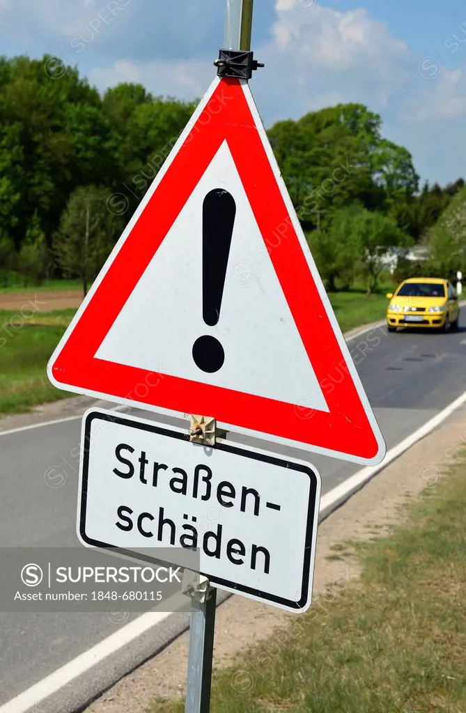 Traffic signs, danger sign, lettering Strassenschaeden, German for roadway damage, Germany, Europe