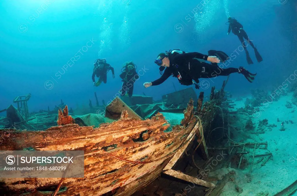 Divers at shipwreck, Red Sea, Egypt, Africa