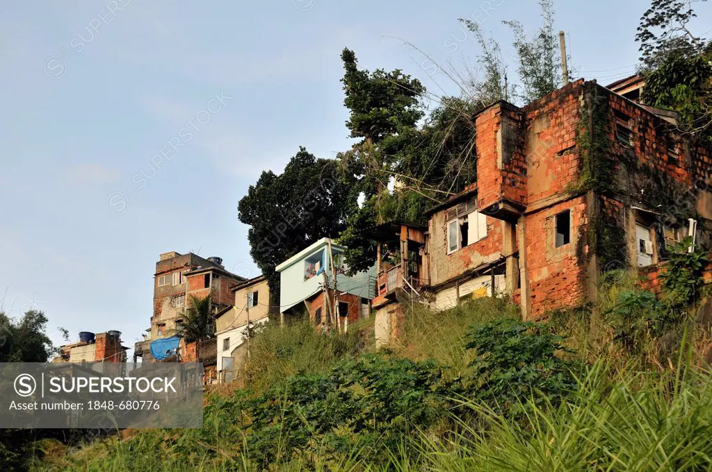 Simple houses built on the erosion-prone hillside of Favela Morro da Formiga, Tijuca district, Rio de Janeiro, Brazil, South America