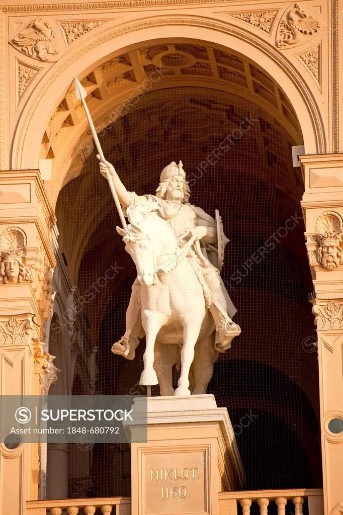 Equestrian statue of Niklot, ancestor of the dukes and grand dukes of Mecklenburg, in the front facade of Schwerin Castle, state capital Schwerin, Mec...