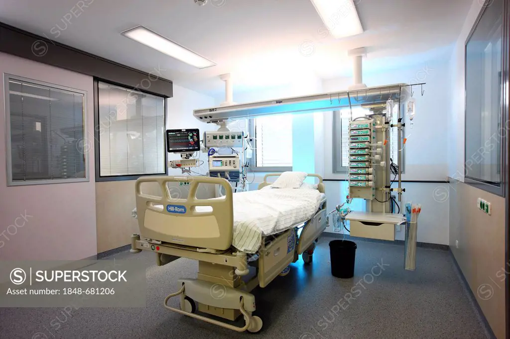 ICU or intensive care unit, empty patient bed ready for a new patient, medical equipment for the care, ventilation and monitoring of the patient, hosp...