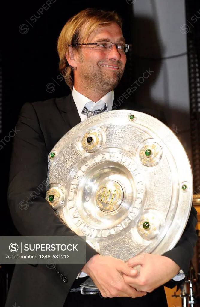 Coach Juergen Klopp with German Champion trophy, Borussia Dortmund football club, champion celebration in the Dortmund U building, Dortmund, North Rhi...