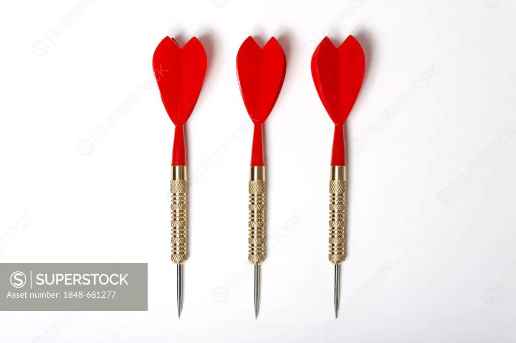 Three red darts