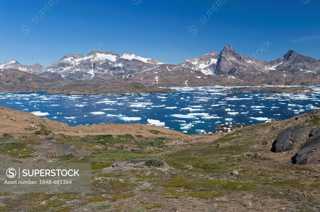 Floating ice sheets and mountains, Tasiilaq or Ammassalik, East Greenland, Greenland