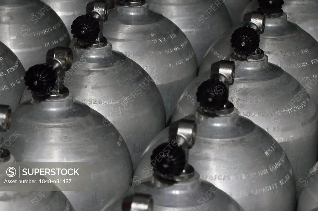 Scuba tanks, oxygen bottles for diving under pressure, compressed gas cylinders