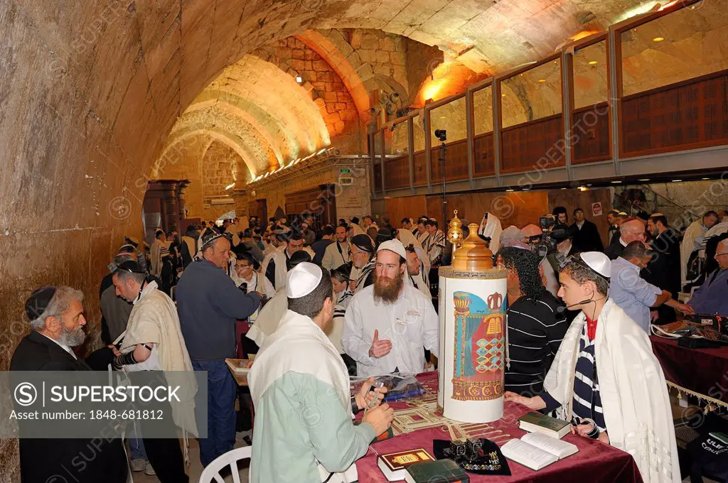 Bar Mitzvah, Jewish coming of age ritual, decorated Torah scroll on table with young man celebrating his Bar Mitzvah, Haftarah, underground part of th...