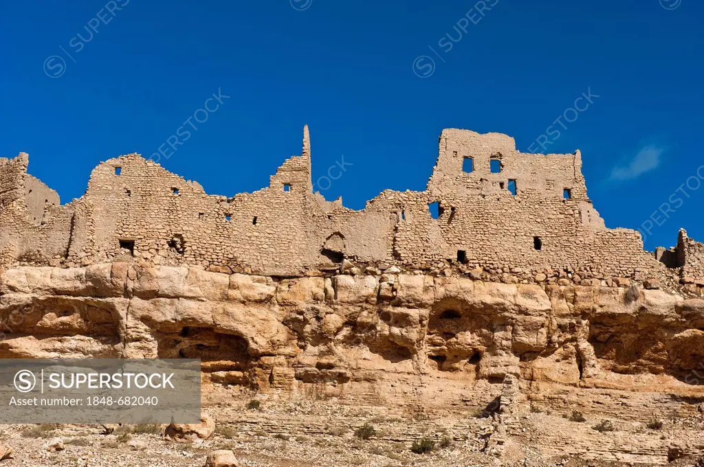 Ruins of an abandoned village on a cliff, Ksar Meski, Ziz Valley, southern Morocco, Morocco, Africa