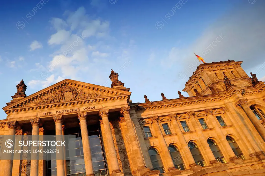 Reichstag building in evening light, Deutscher Bundestag, German Parliament, lettering Dem Deutschen Volke, German for To the German people, relief in...