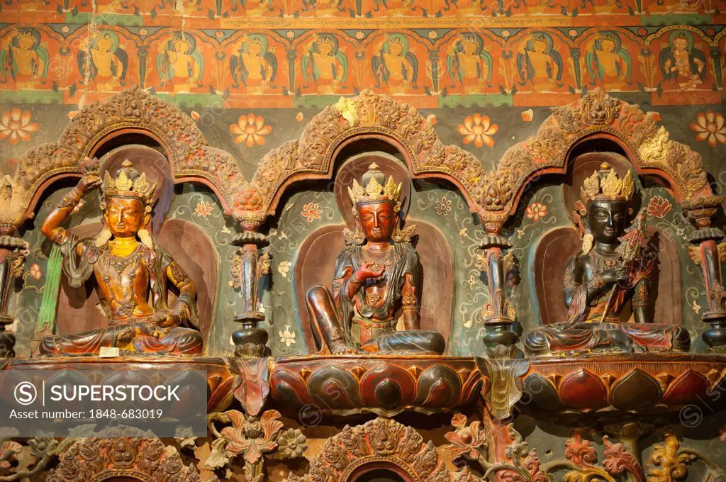 Tibetan Buddhism, Newari-style sculptures, colourfully painted statues made of wood and clay, three Buddha statues, Palcho Monastery, also known as Pe...