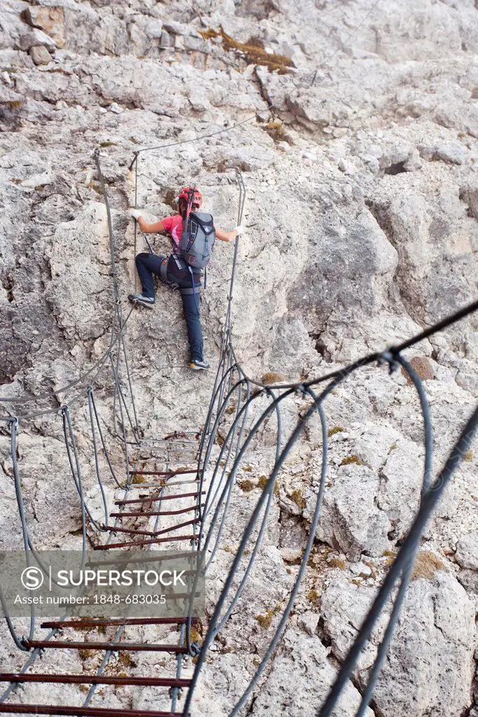 Mountain climber during the ascent of Piz Boe Mountain, Dolomites, Piazzetta climbing route, Alto Adige, Italy, Europe