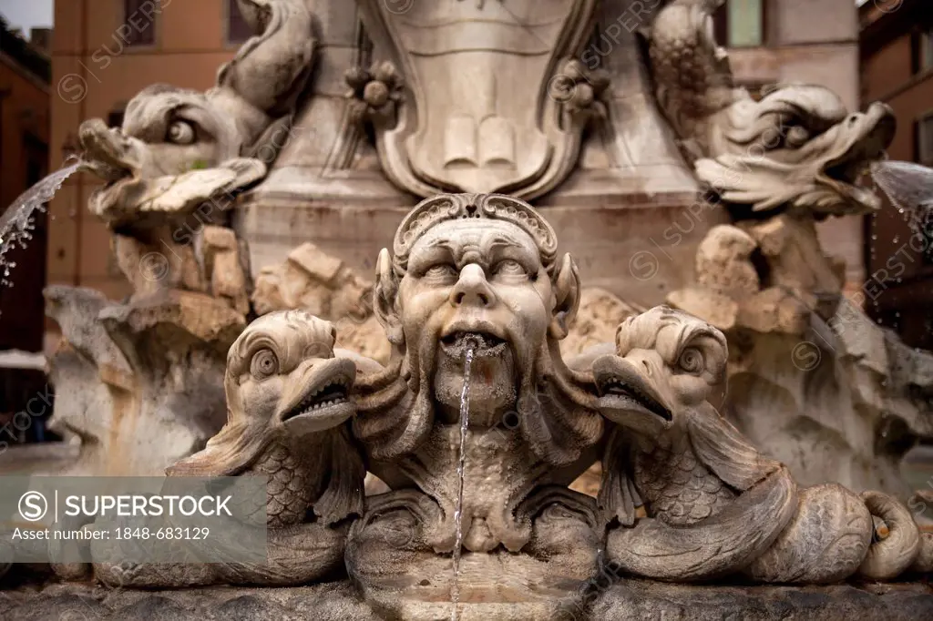 Head spouting water, detail of the fountain with the obelisk on the Piazza della Rotonda in front of the Pantheon in Rome, Lazio, Italy, Europe