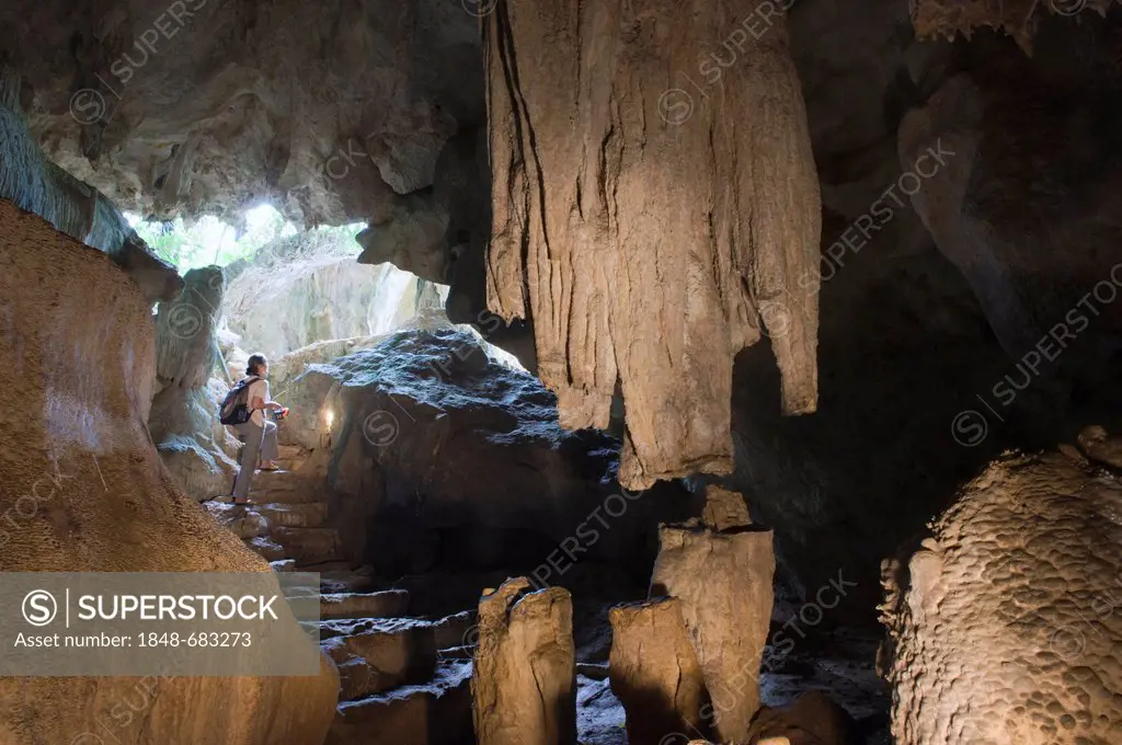 Tourist exploring the Phet Cave, dripstone cave, Ao Luek, Phang Nga, Thailand, Southeast Asia