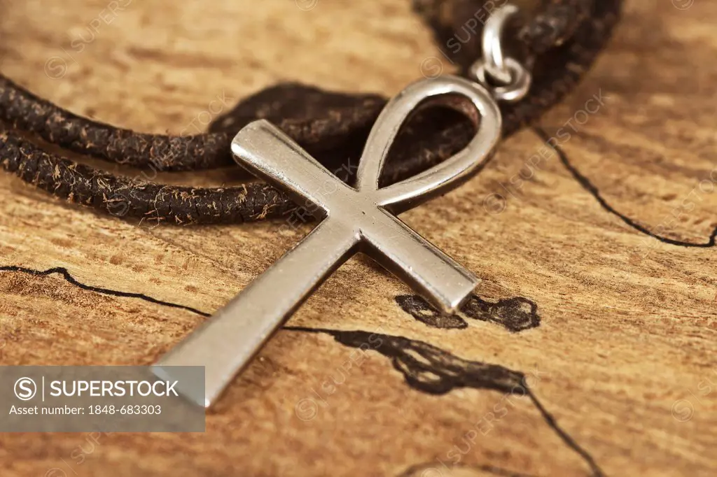Ankh cross on a leather band