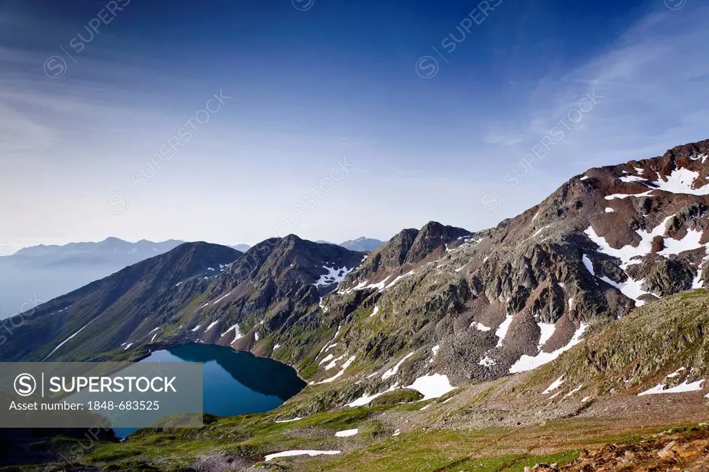 View during ascent of Mt Hasenohr with Arzkarsee Lake in valley, Stelvio National Park, South Tyrol, Italy, Europe
