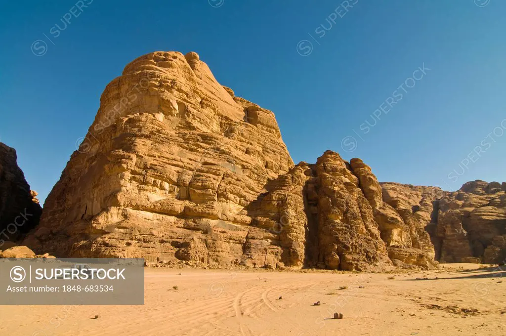 Rocks, an off-road vehicle in front, desert, Wadi Rum, Jordan, Middle East