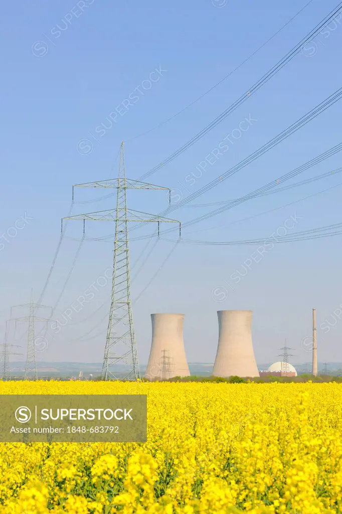 Nuclear power plant Grafenrheinfeld, out of service, canola field in front, Lower Franconia, Bavaria, Germany, Europe